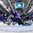 SOCHI, RUSSIA - APRIL 25: Slovakia's David Okolicany #29 grabs a glove save during relegation round action 2013 IIHF Ice Hockey U18 World Championship. (Photo by Matthew Murnaghan/HHOF-IIHF Images)